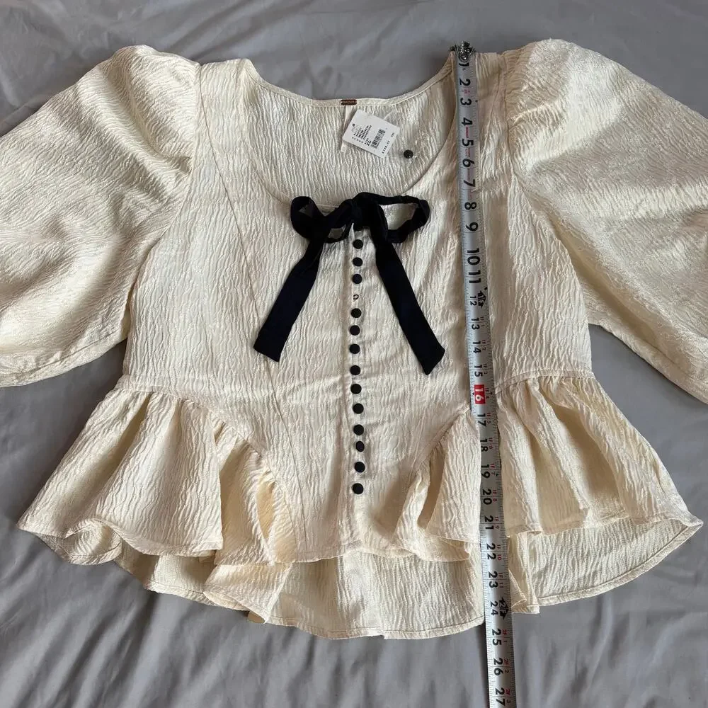 Free People NWT Cream Peplum Blouse Women's XL Textured Puff Sleeve Bow Top